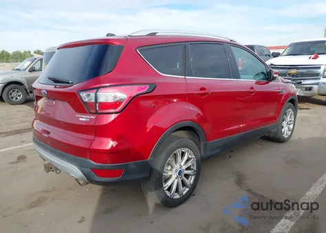 2017 Ford Escape Titanium z USA, uszkodzony, nr VIN 1FMCU9J96HUF08797